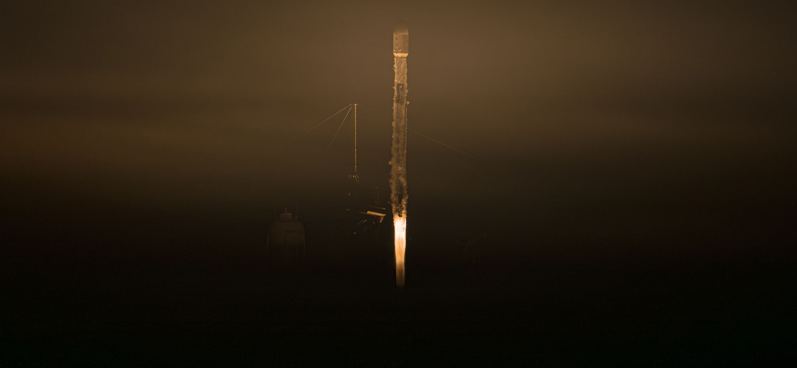 Falcon 9 night launch, SpaceX photography used as a stand-in for the growing LEO economy.